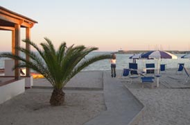 Italy Sardinia Resort - Beach at sunset